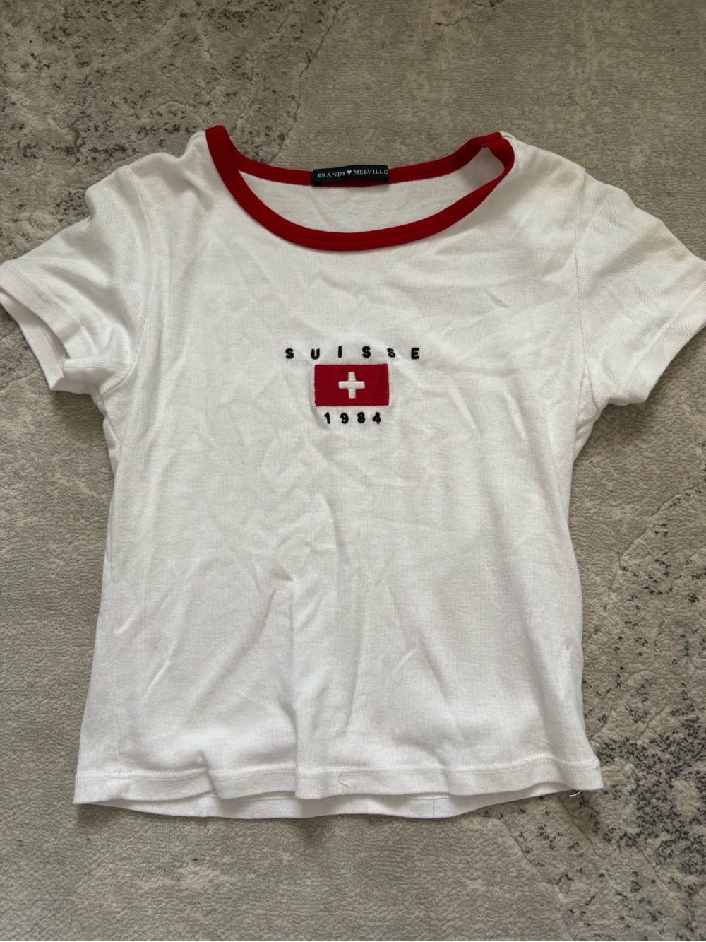 Brandy Melville White Tee with Red Trim and Swiss Motif